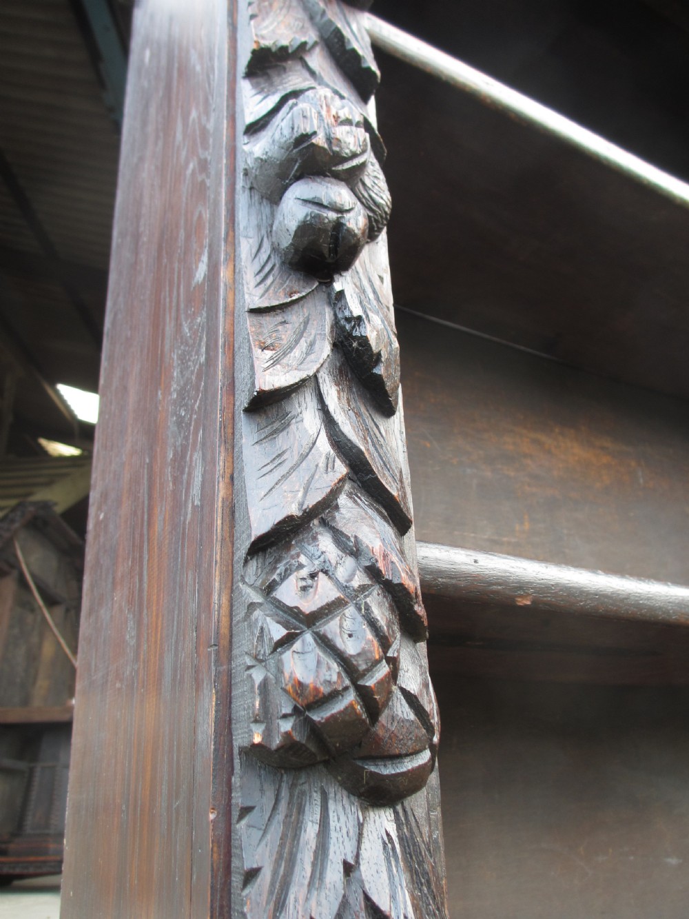 Victorian Oak carved open bookcase with adjustable shelves, lion heads and floral carved columns  View VIII