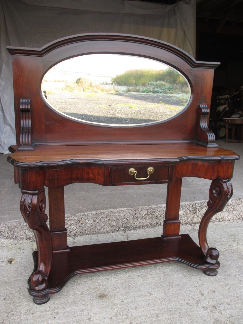 Victorian mahogany mirrored duchess dressing table with scroll supports View IV