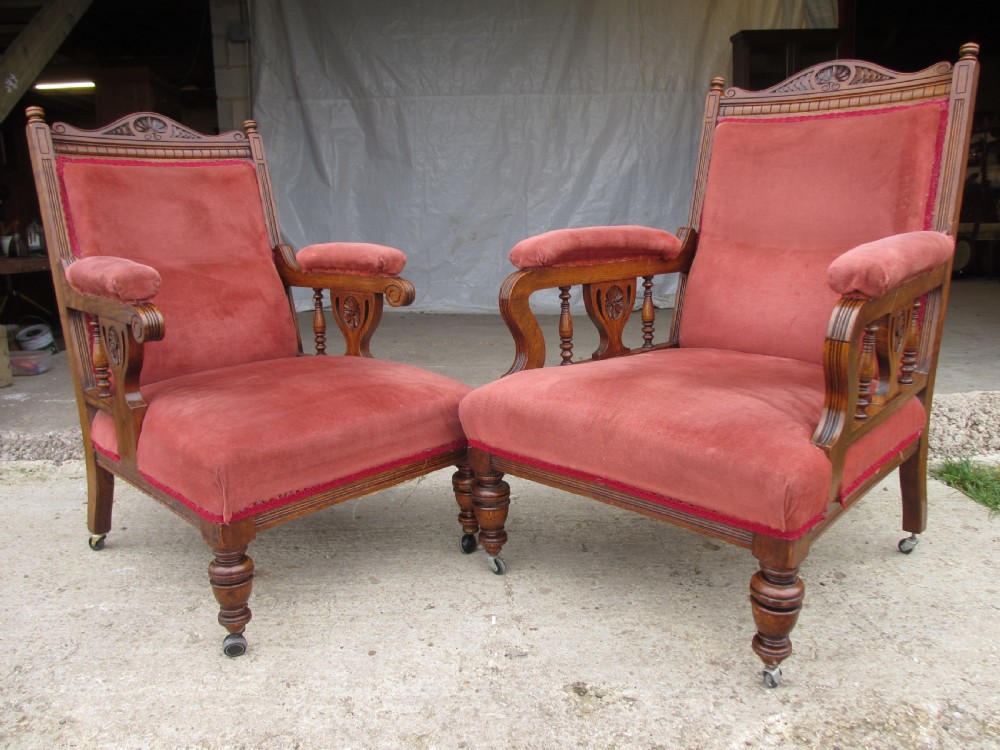 Pair lady's and gent's victorian oak upholstered parlour armchairs View II