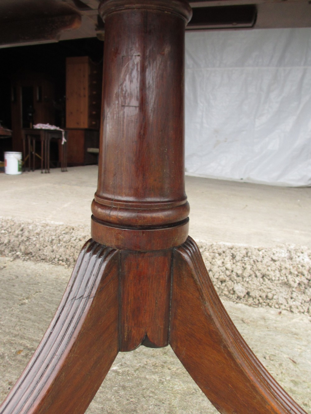 19th century mahogany extending twin tripod d-end dining table with brass paw castors with 2 leaves View VIII