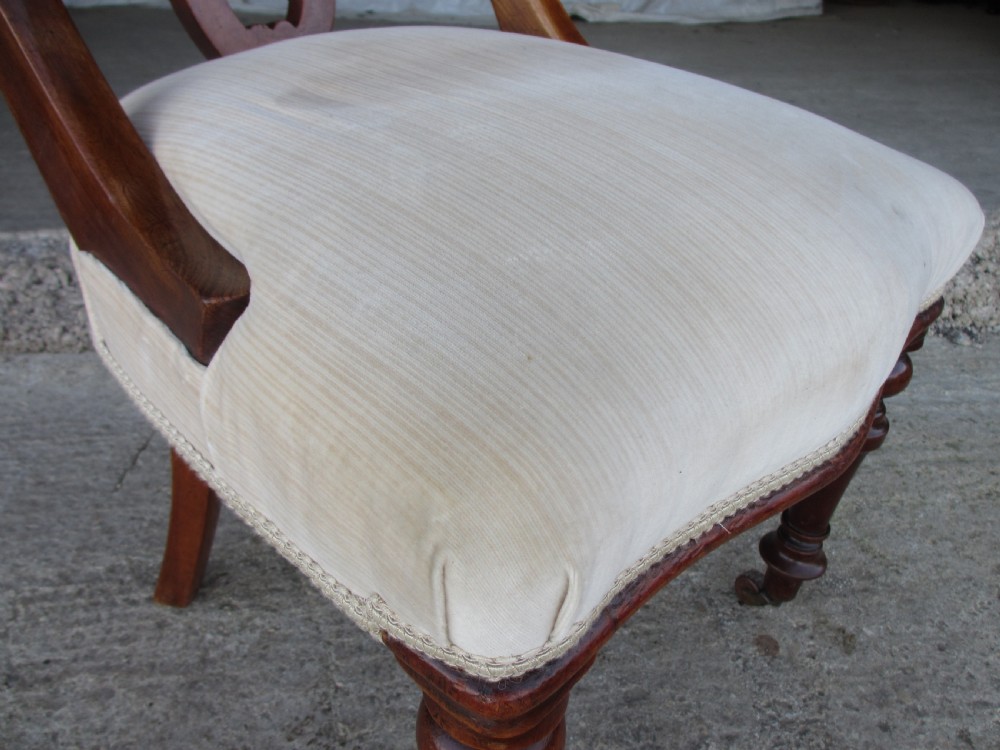 Set of 4 Victorian mahogany arched splat back dining chairs with overstuffed seats on turned forelegs View VIII