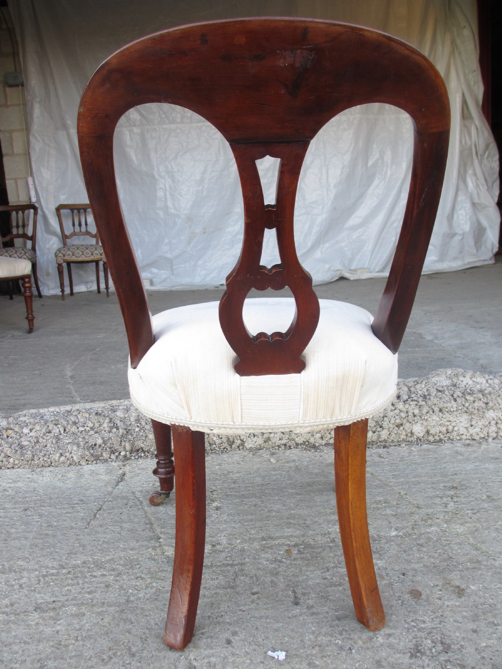 Set of 4 Victorian mahogany arched splat back dining chairs with overstuffed seats on turned forelegs View XIII