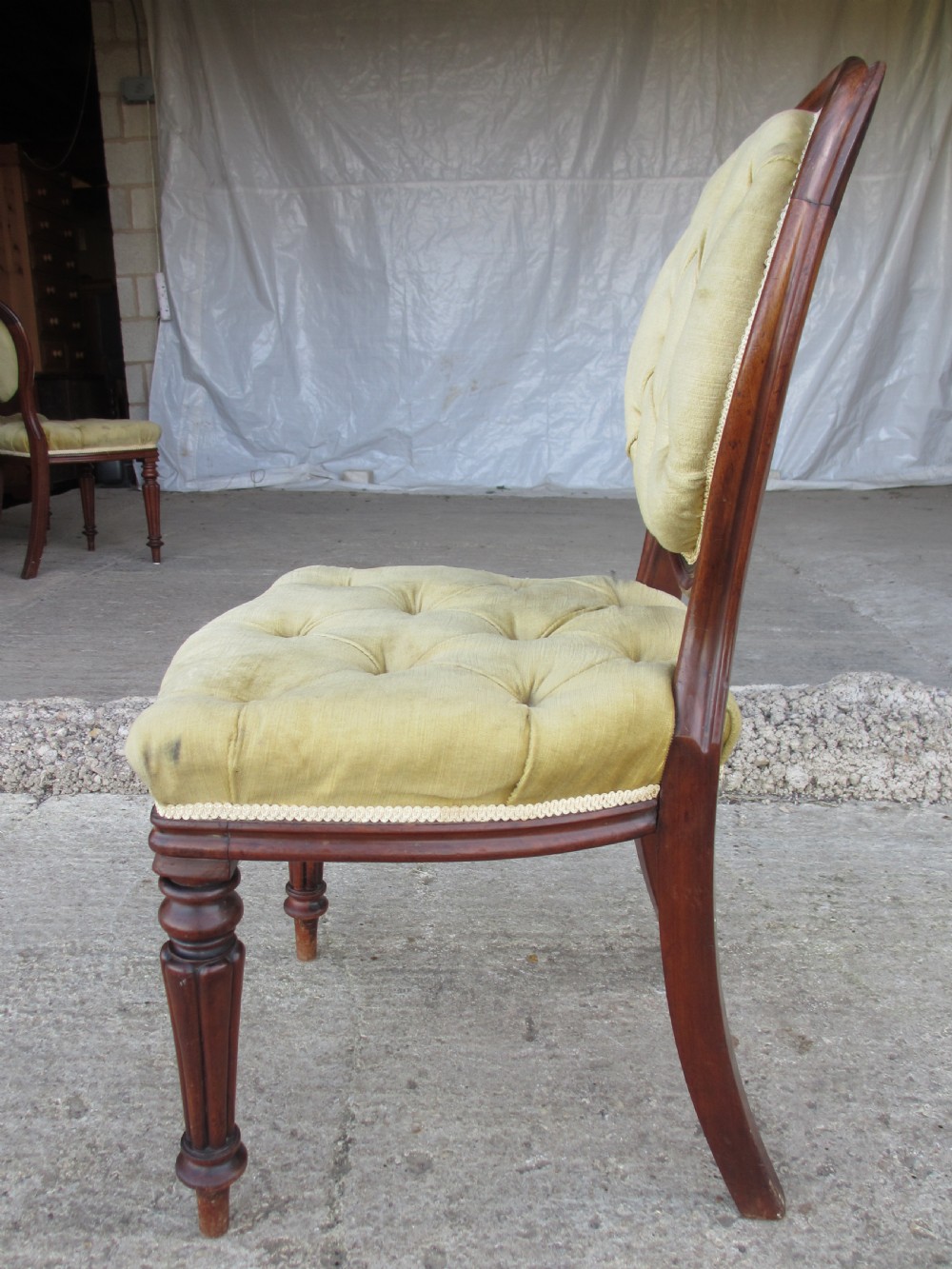 Set of 6 quality 19th century dining chairs. Button upholstered balloon backs with tapered reeded forelegs View XI