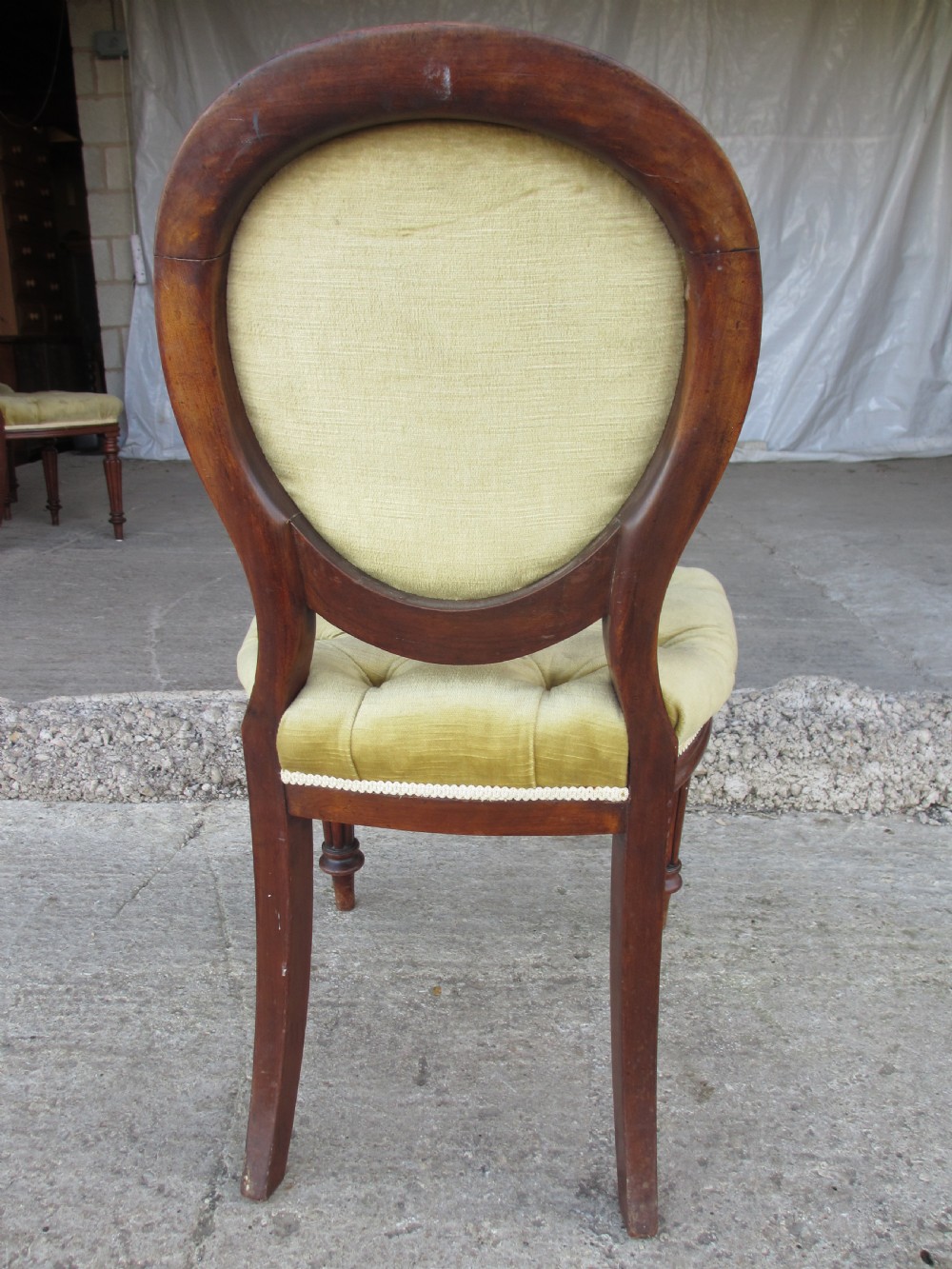 Set of 6 quality 19th century dining chairs. Button upholstered balloon backs with tapered reeded forelegs View XII