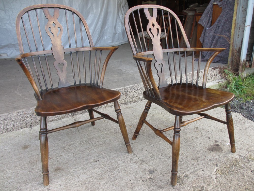 Pair elm seated stick slat windsor armchairs with turned splayed legs c1920