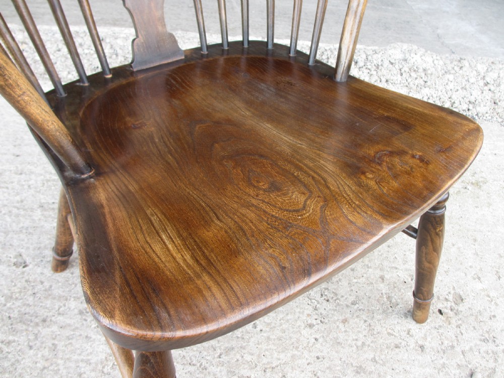 Pair elm seated stick slat windsor armchairs with turned splayed legs c1920 View X