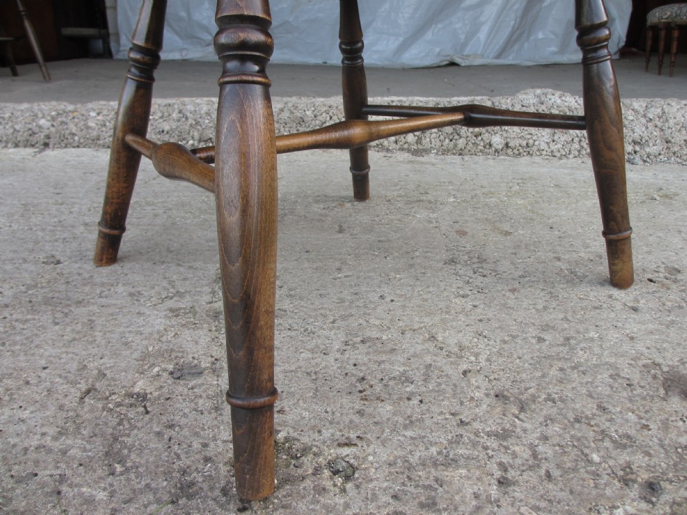 Pair elm seated stick slat windsor armchairs with turned splayed legs c1920 View XII