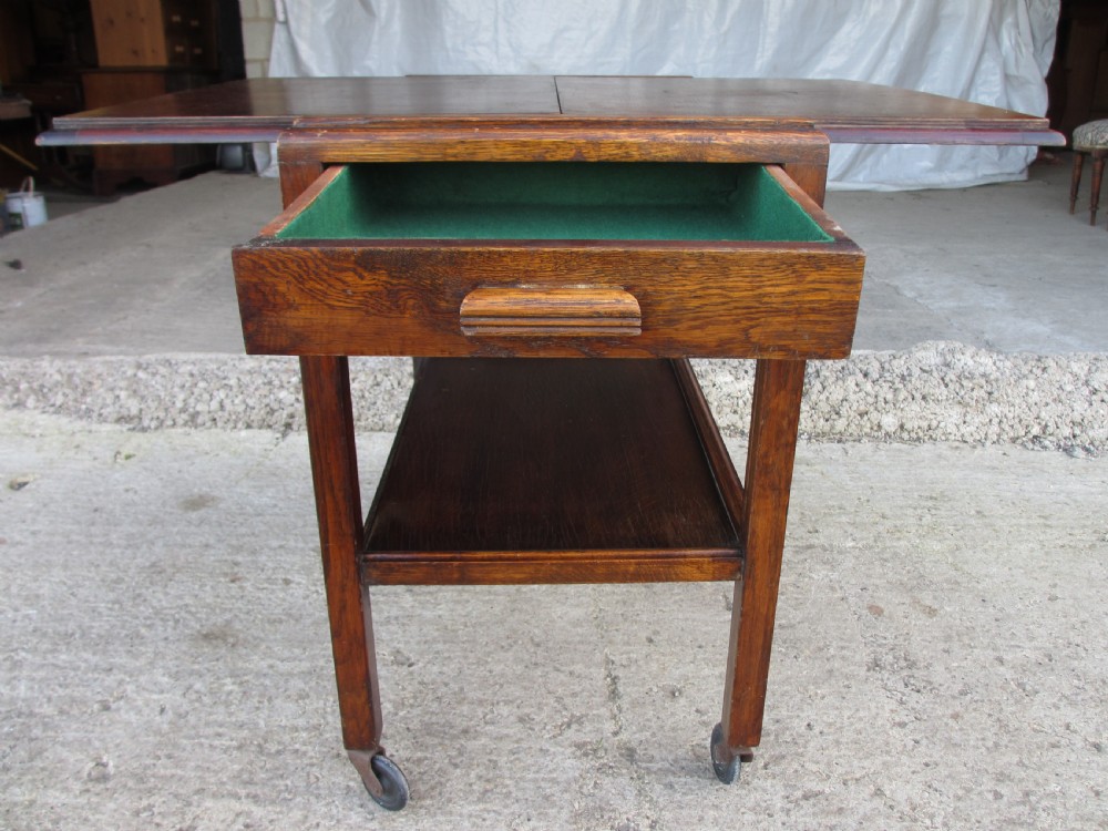 Oak extending tea trolley with cutlery drawer on castors C1920 View III