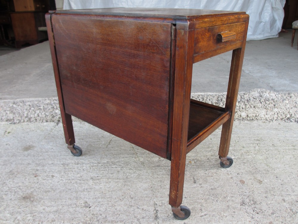 Oak extending tea trolley with cutlery drawer on castors C1920 View IV