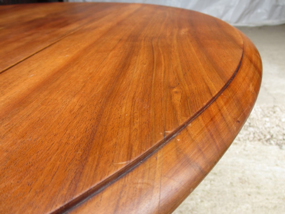 Victorian mahogany circular top drop leaf dining table turned reeded supports View VI