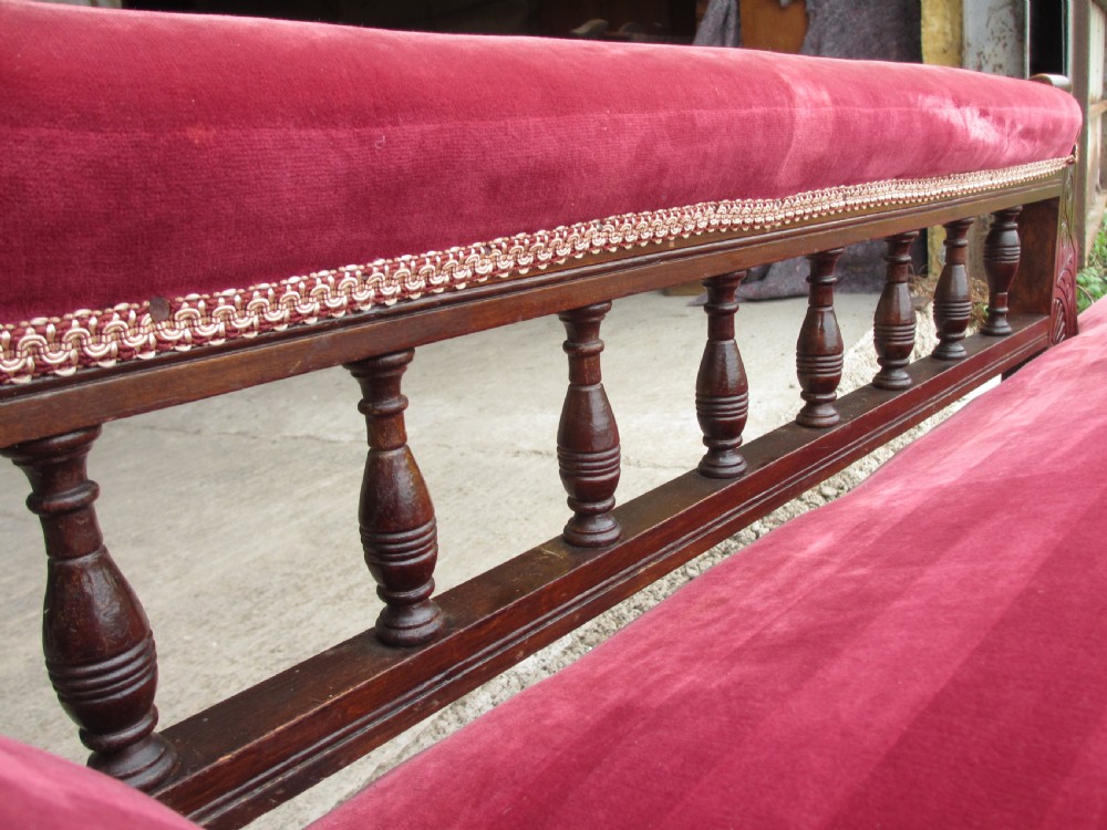 Victorian mahogany upholstered chaise longue turned supports and castors  View V