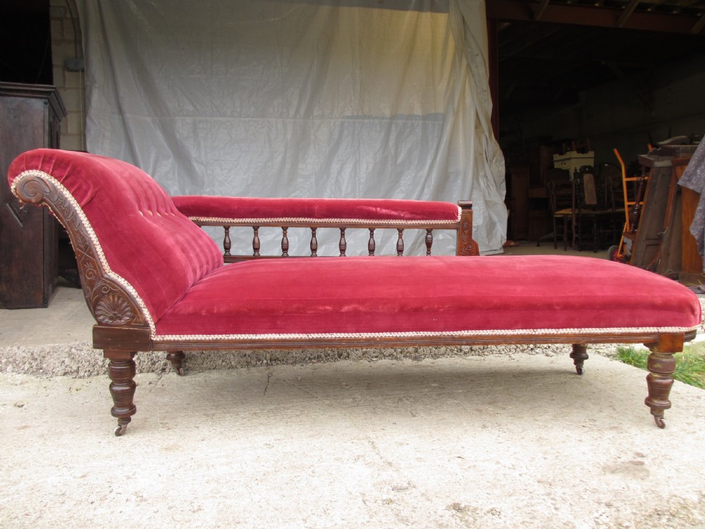 Victorian mahogany upholstered chaise longue turned supports and castors  View VIII
