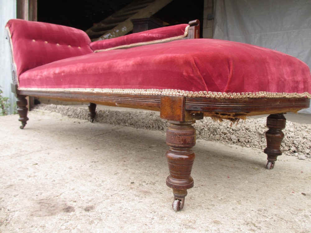 Victorian mahogany upholstered chaise longue turned supports and castors  View XVII