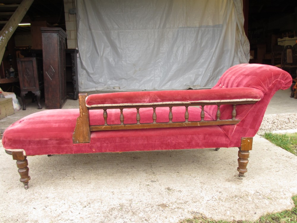Victorian mahogany upholstered chaise longue turned supports and castors  View XVIII