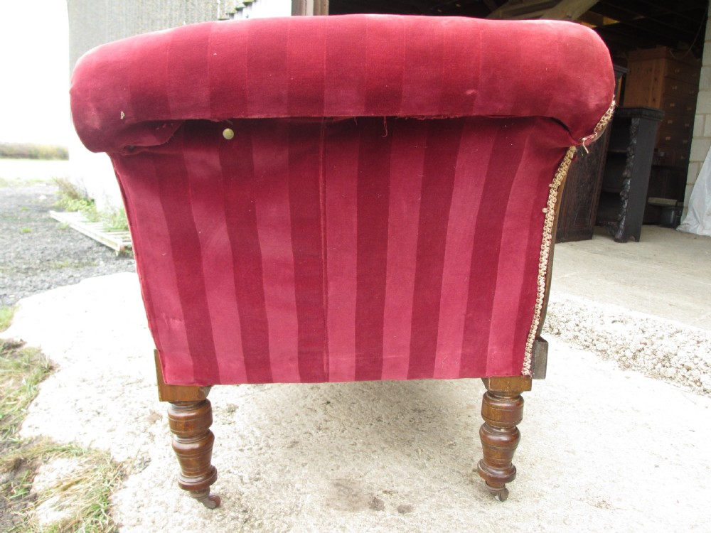 Victorian mahogany upholstered chaise longue turned supports and castors  View XIX