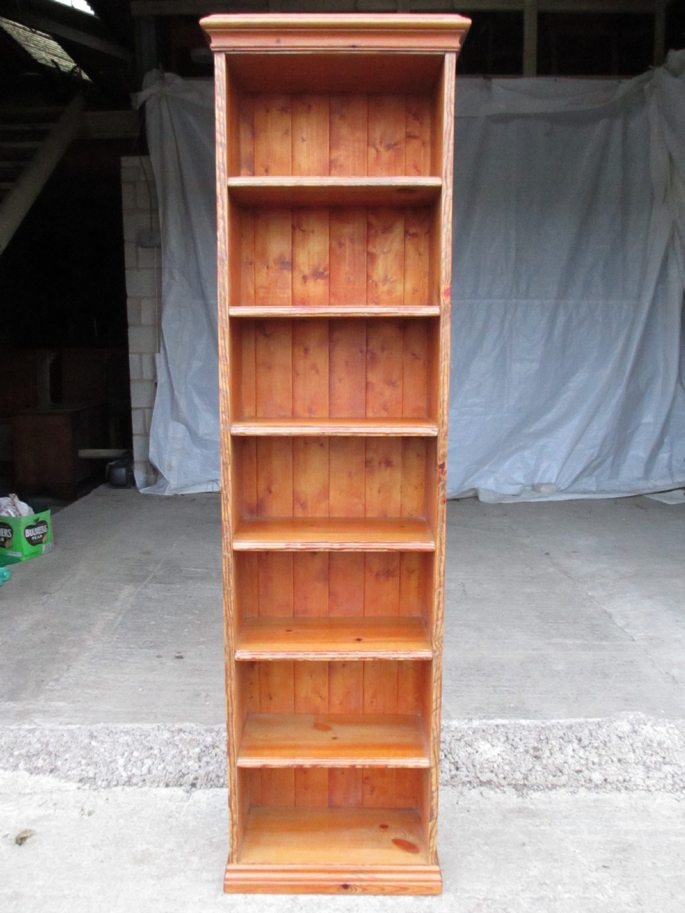Tall slim pine open bookcase C1920