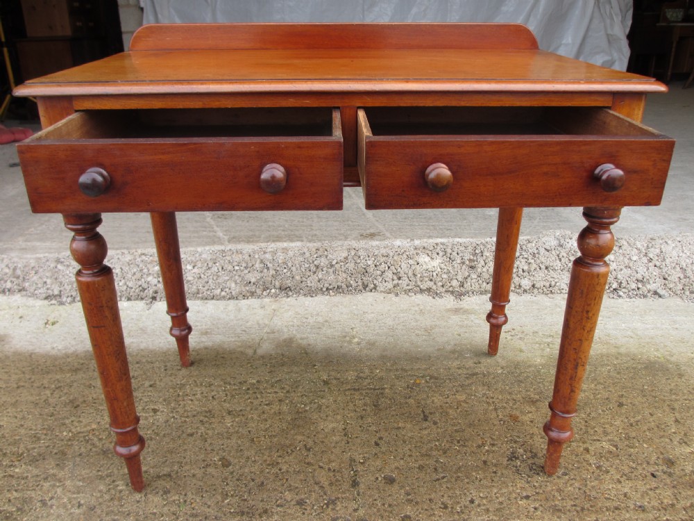 Victorian mahogany twin drawer writing desk on nicely turned supports View III