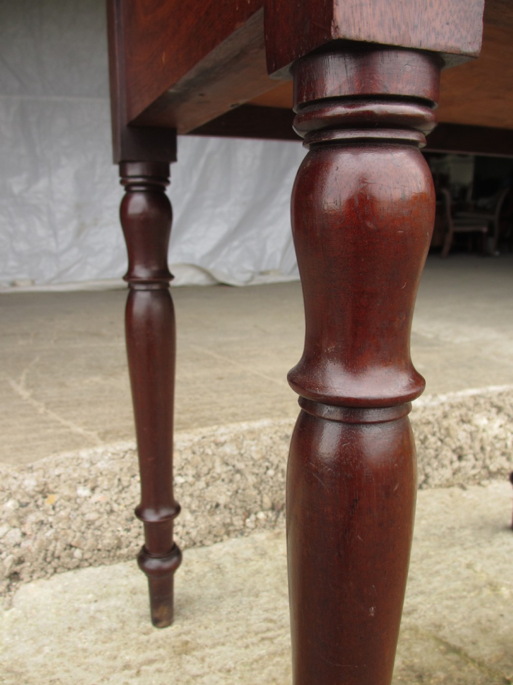 19th Century mahogany stationery backed writing desk on turned supports with one large and 4 small drawers View VIII