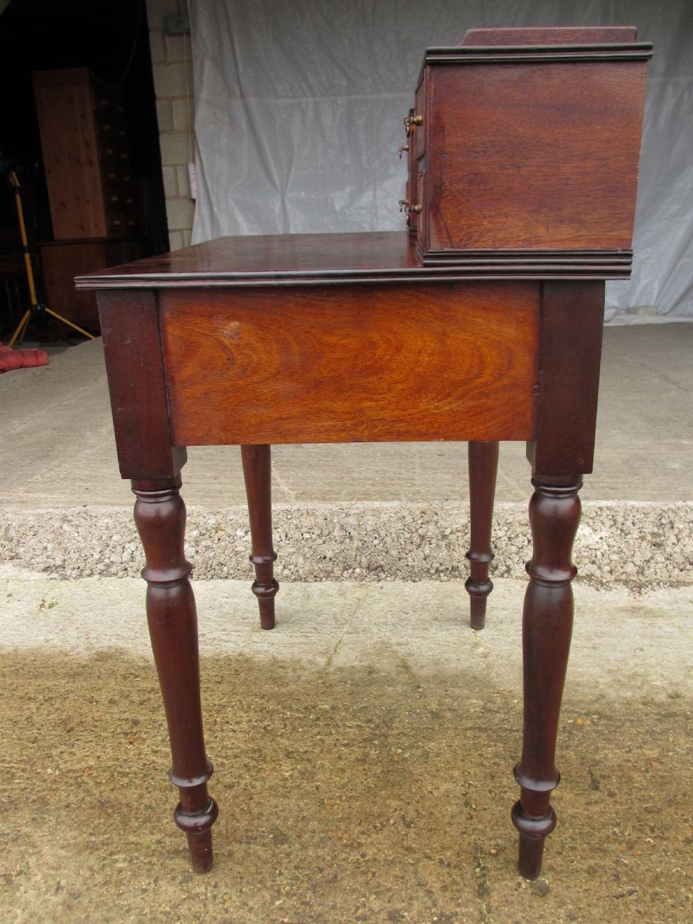 19th Century mahogany stationery backed writing desk on turned supports with one large and 4 small drawers View IX