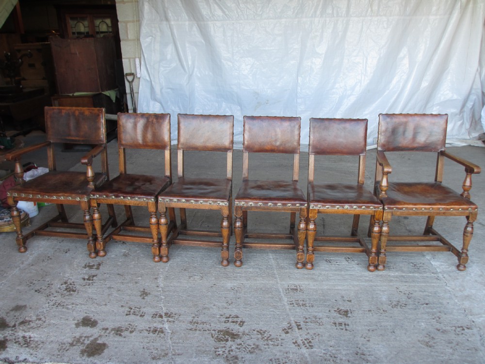 Set of 6 17th century style oak and leather studded dining chairs 2 carvers 4 chairs c1890 View II