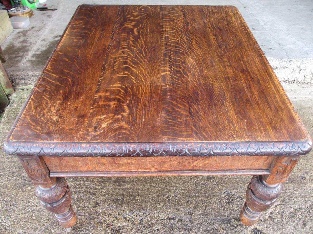 Victorian carved oak green man library writing desk twin drawers carved legs on castors with stops View XVIII