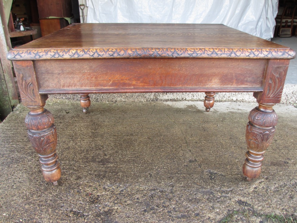 Victorian carved oak green man library writing desk twin drawers carved legs on castors with stops View XIX