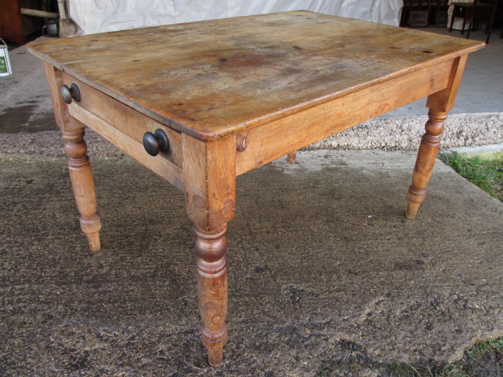 Victorian pine kitchen table with large cutlery drawer on turned legs