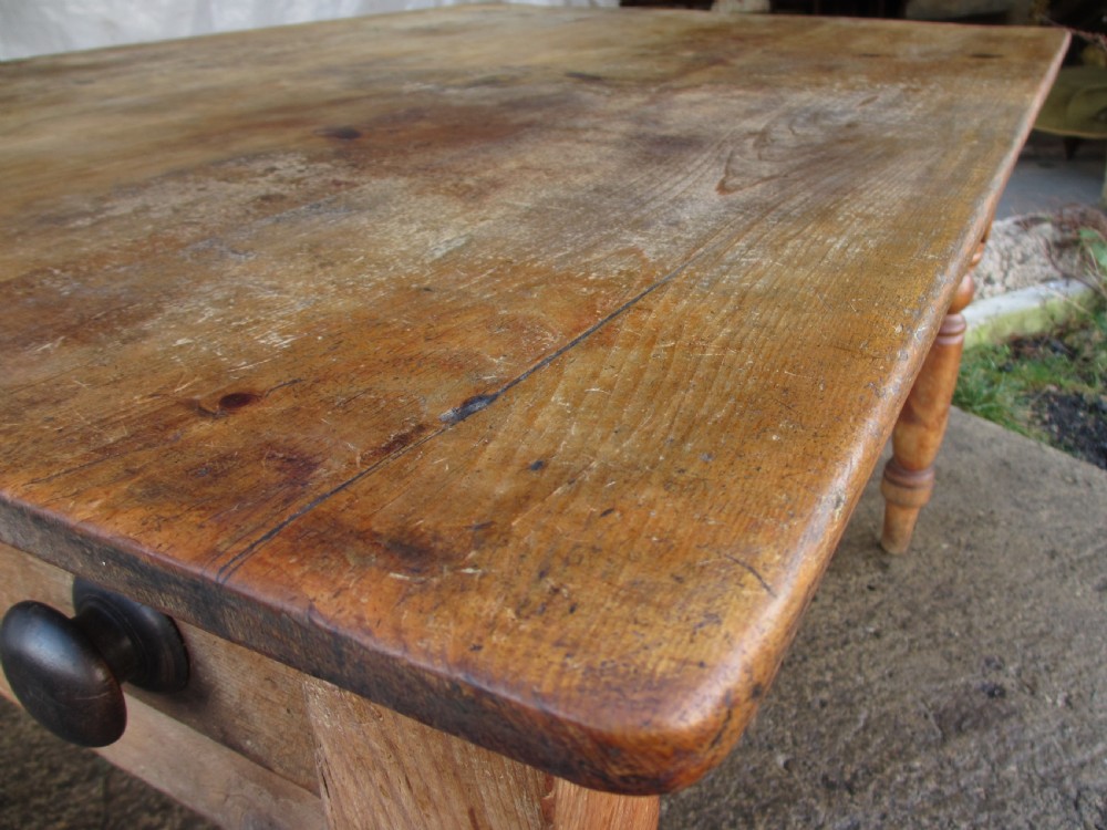 Victorian pine kitchen table with large cutlery drawer on turned legs View III