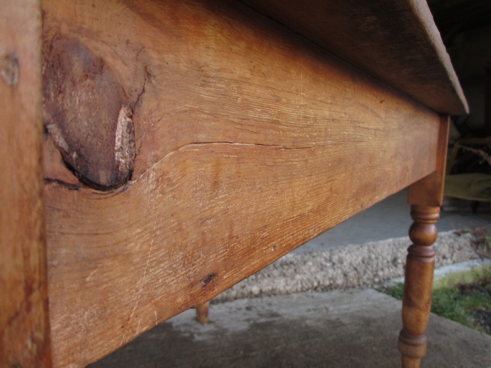 Victorian pine kitchen table with large cutlery drawer on turned legs View IV