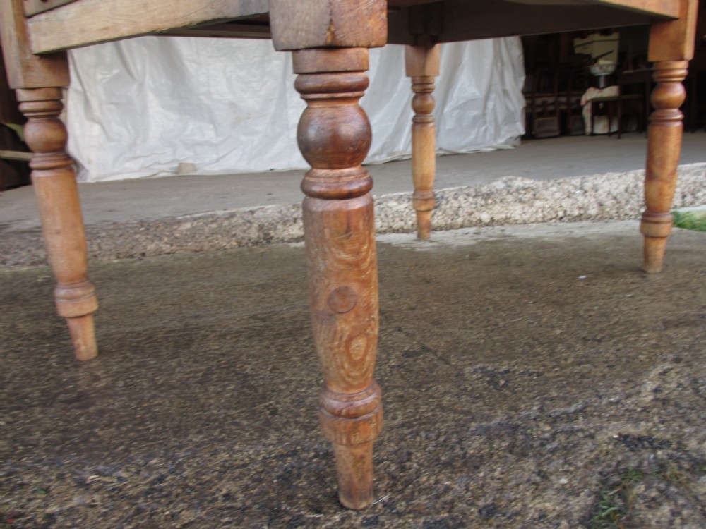 Victorian pine kitchen table with large cutlery drawer on turned legs View VIII