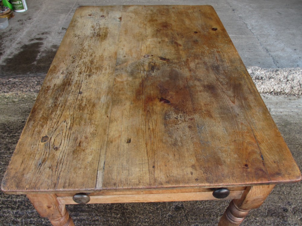 Victorian pine kitchen table with large cutlery drawer on turned legs View XV