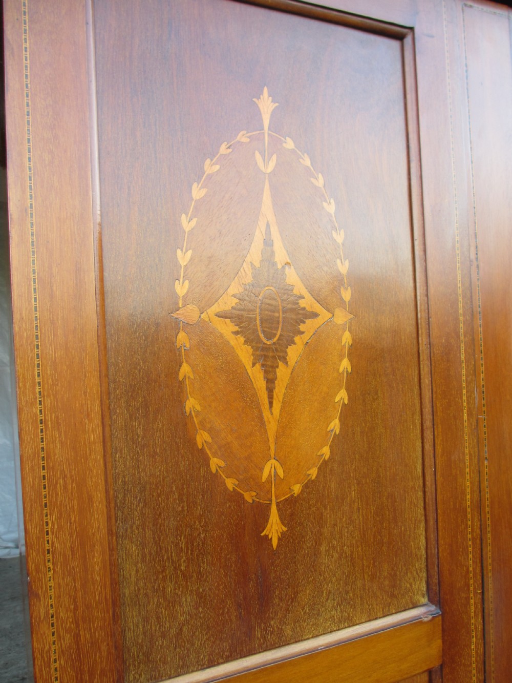 Edwardian Mahogany oval mirror inlaid single door wardrobe with key View IV