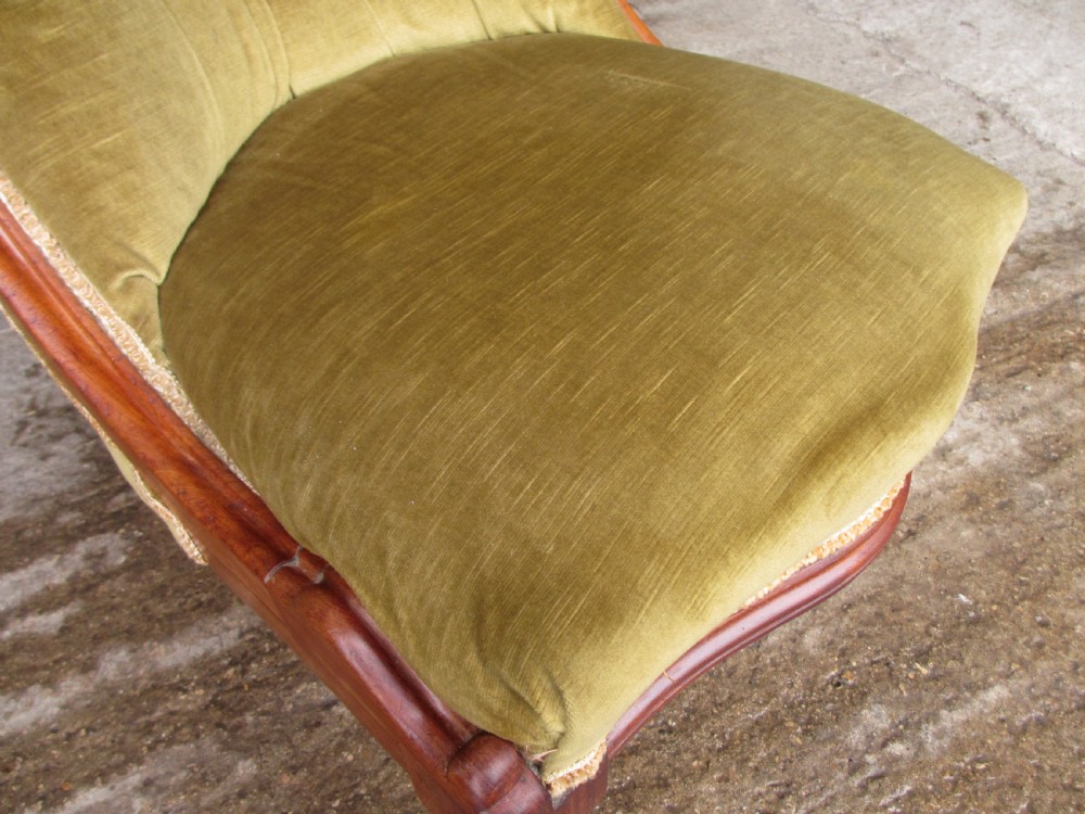 Victorian mahogany serpentine nursing chair Button upholstered Scroll back View V