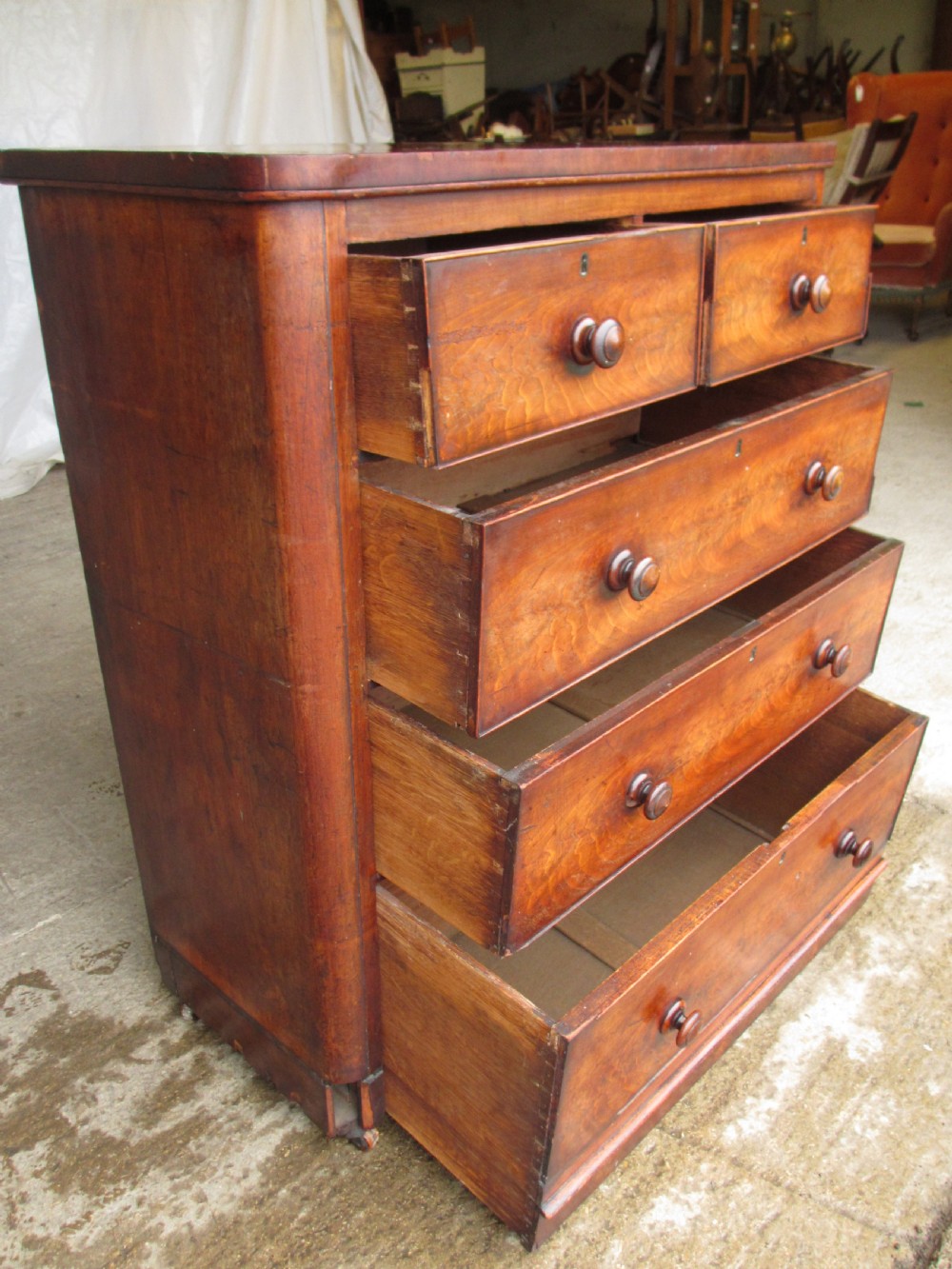 Victorian flame mahogany chest of drawers, bun handles, 2 over 3 View III