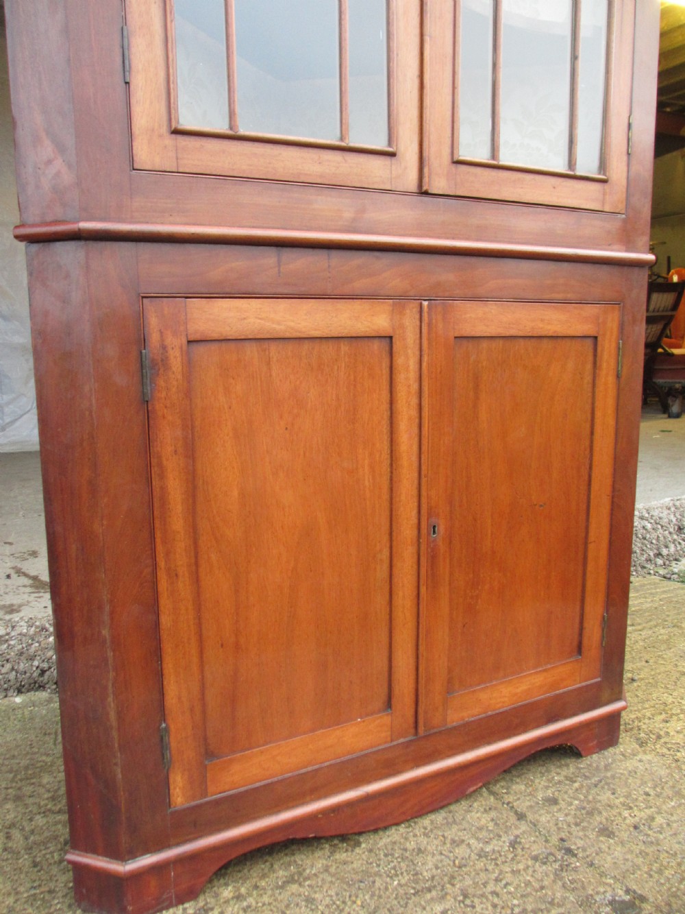 19th C mahogany glazed 2 part corner cabinet with shelves and cupboard View IV