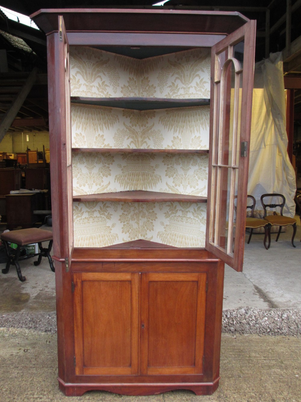 19th C mahogany glazed 2 part corner cabinet with shelves and cupboard View V
