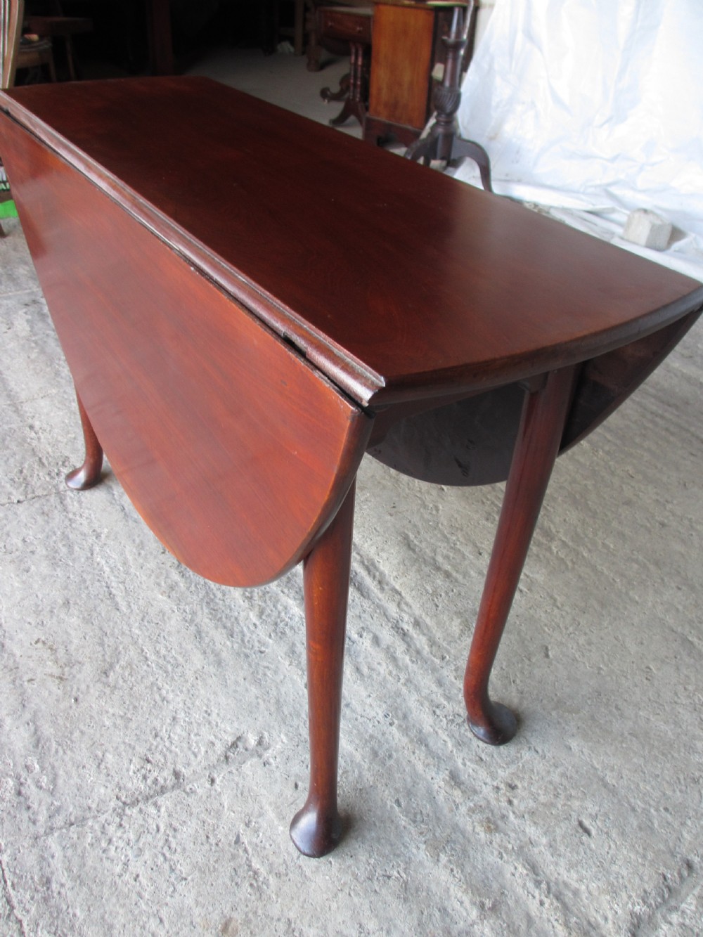 Georgian mahogany oval drop leaf gateleg dining table View VI