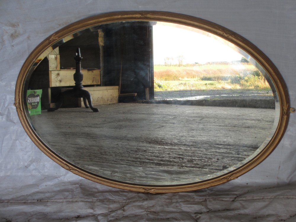 Regency gilt framed oval bevel glass wall hanging mirror  View V
