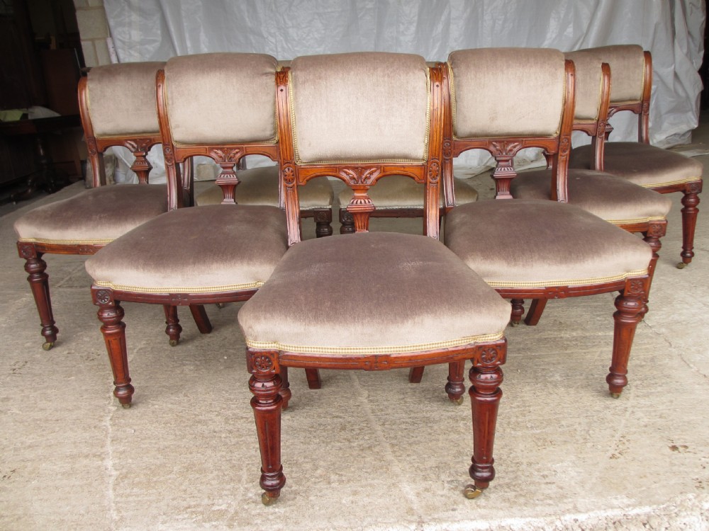 Set of eight Victorian mahogany upholstered dining chairs