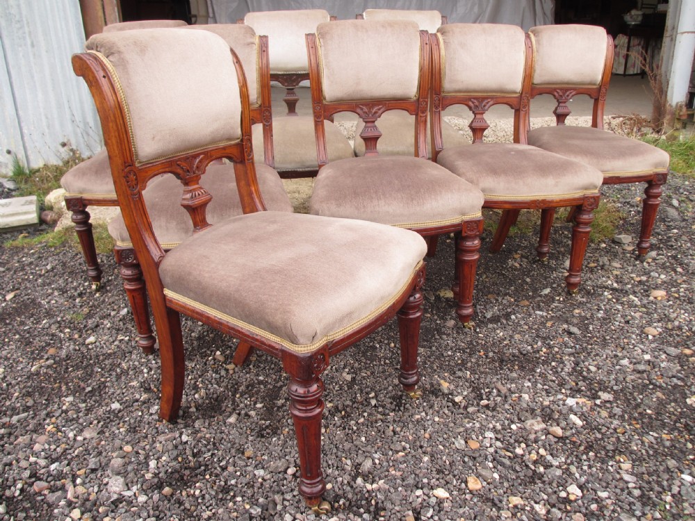 Set of eight Victorian mahogany upholstered dining chairs View II