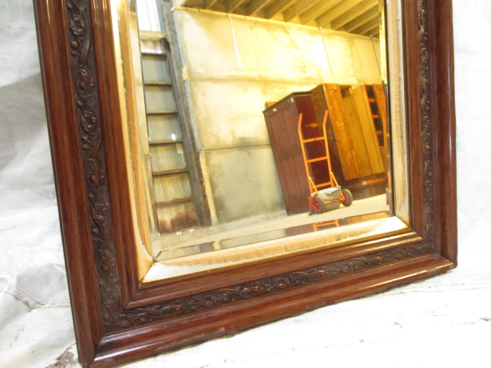 Victorian carved floral mahogany and gilt framed bevel glass wall hanging mirror View III