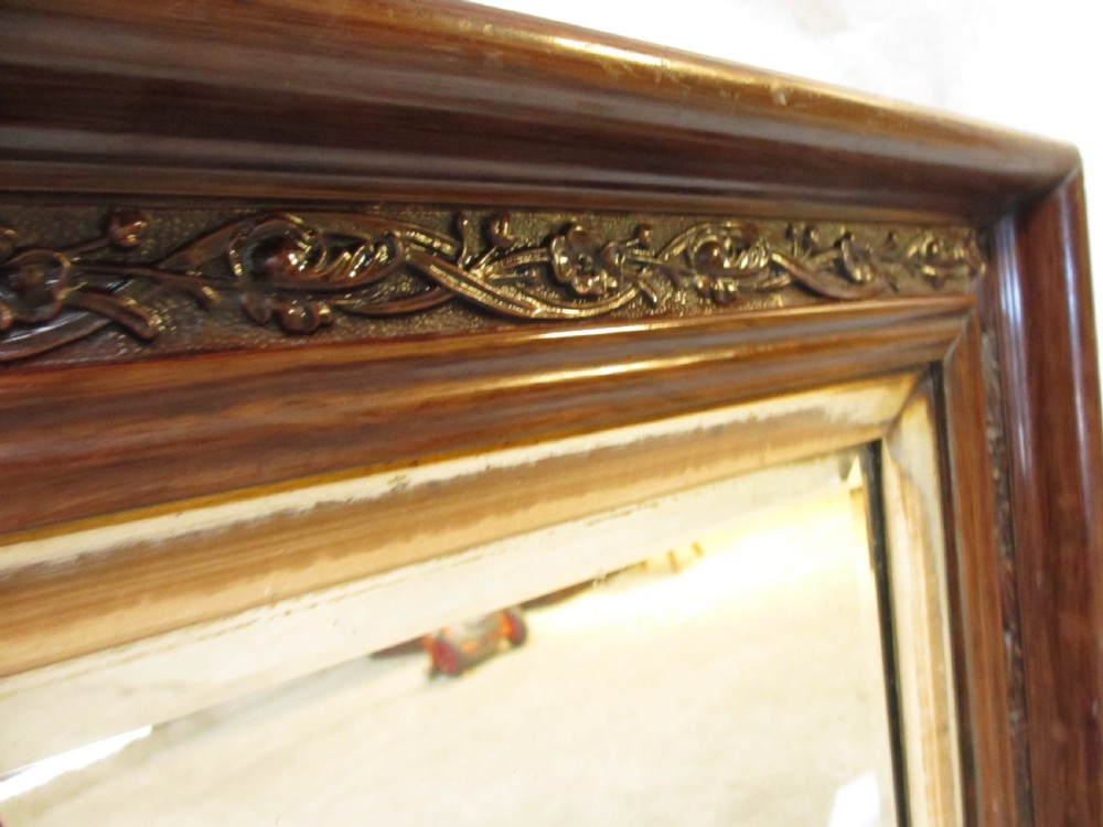 Victorian carved floral mahogany and gilt framed bevel glass wall hanging mirror View IV