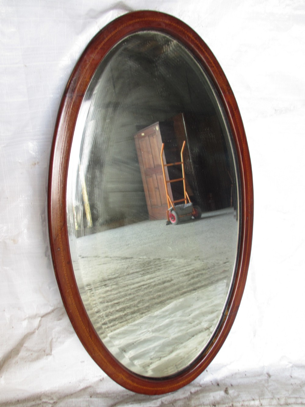 Edwardian inlaid mahogany oval wall hanging mirror with bevel glass View II