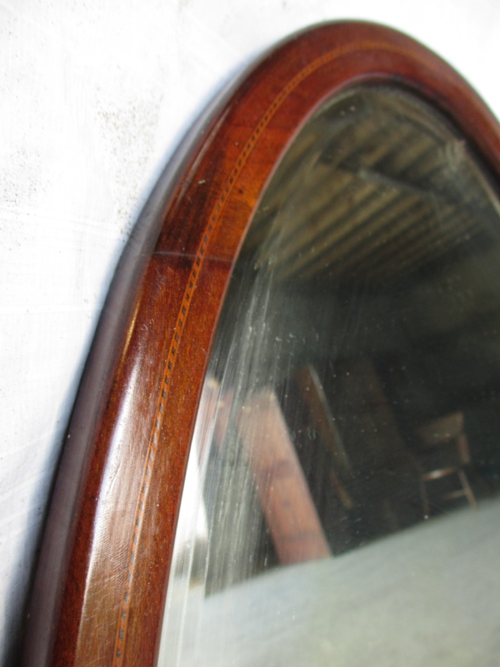 Edwardian inlaid mahogany oval wall hanging mirror with bevel glass View III