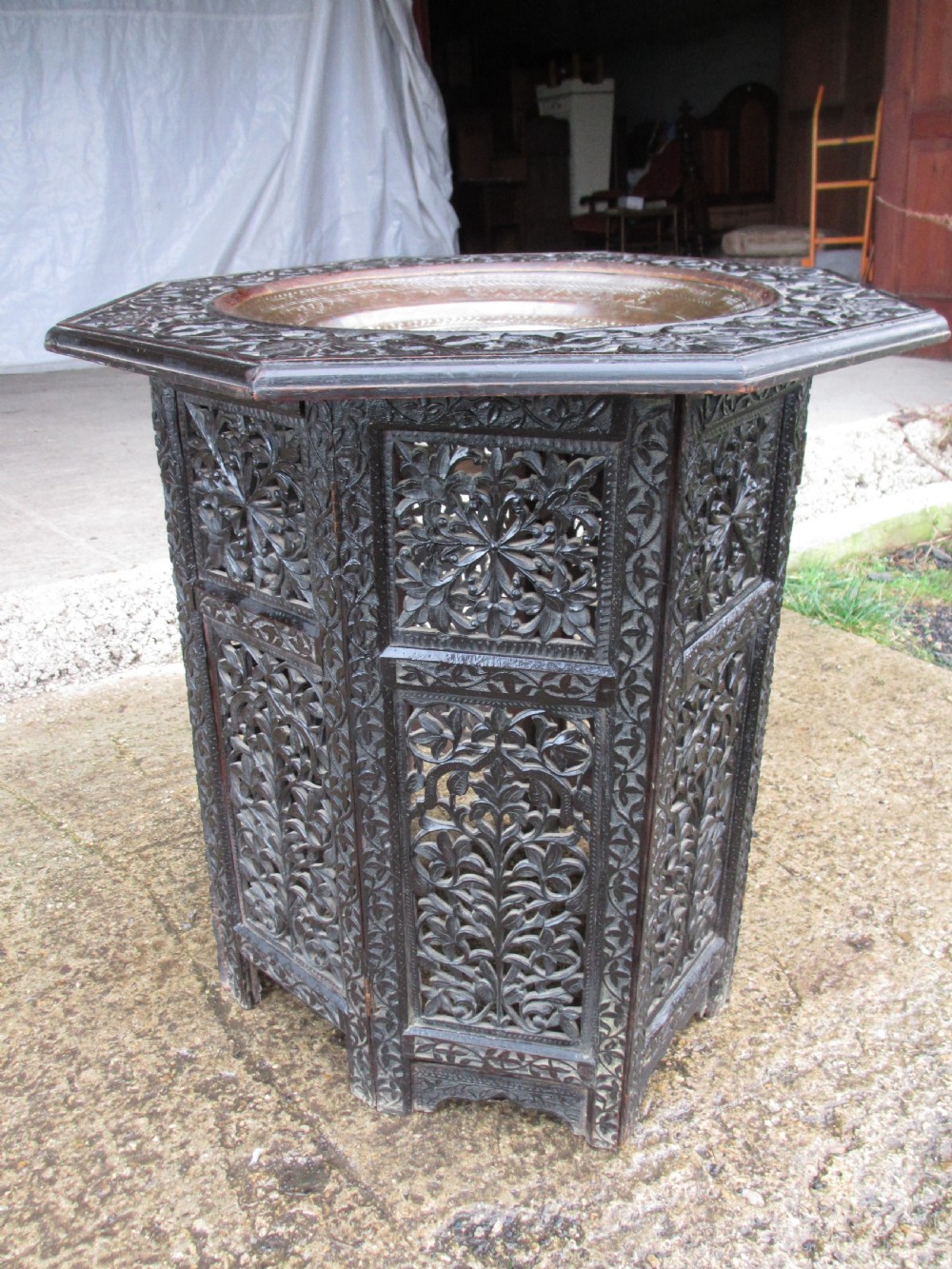 Anglo Indian carved fretted teak fold up octagonal occasional tray table View III