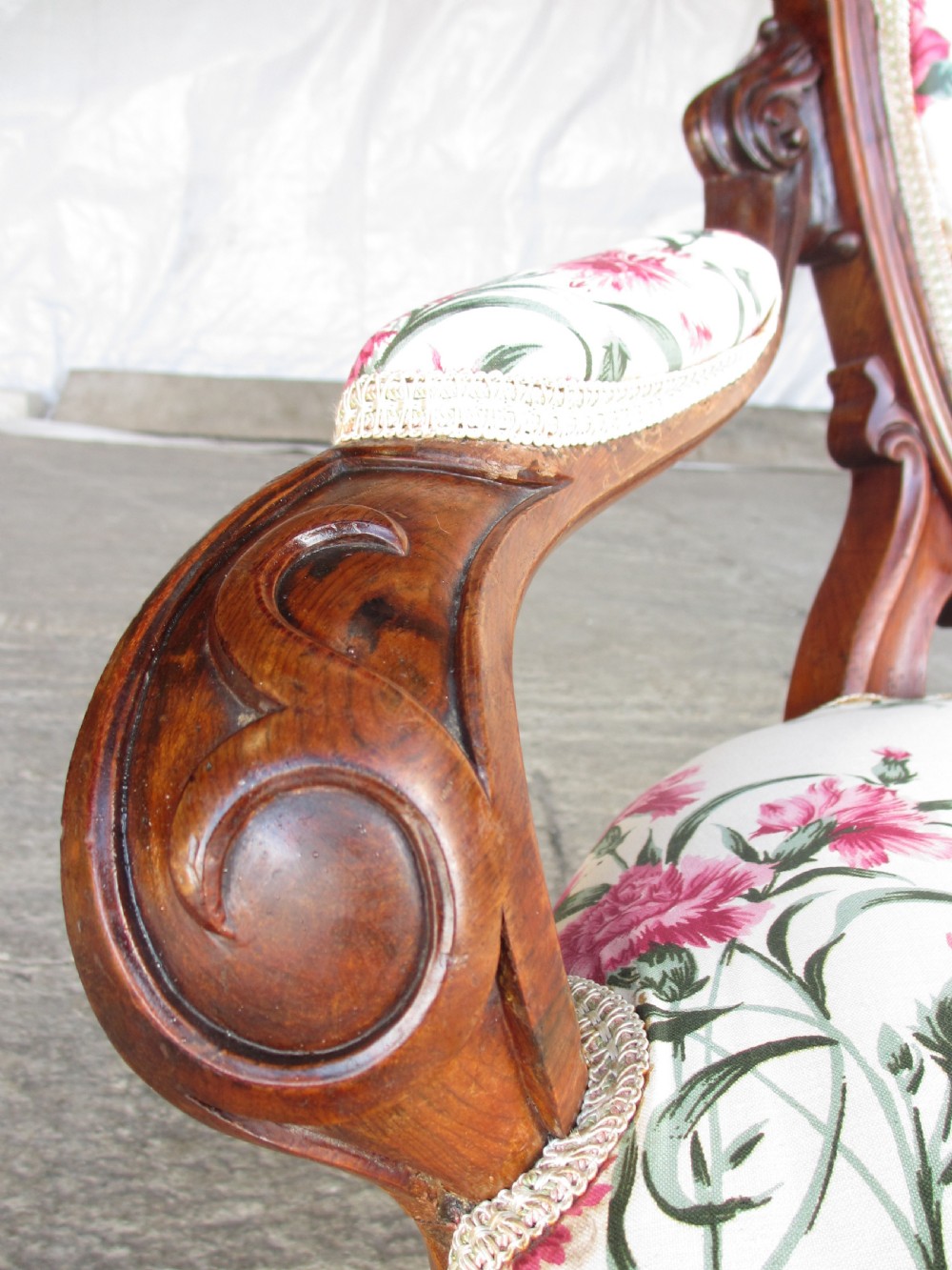 Early Victorian mahogany carved show wood button upholstered spoon back armchair View V