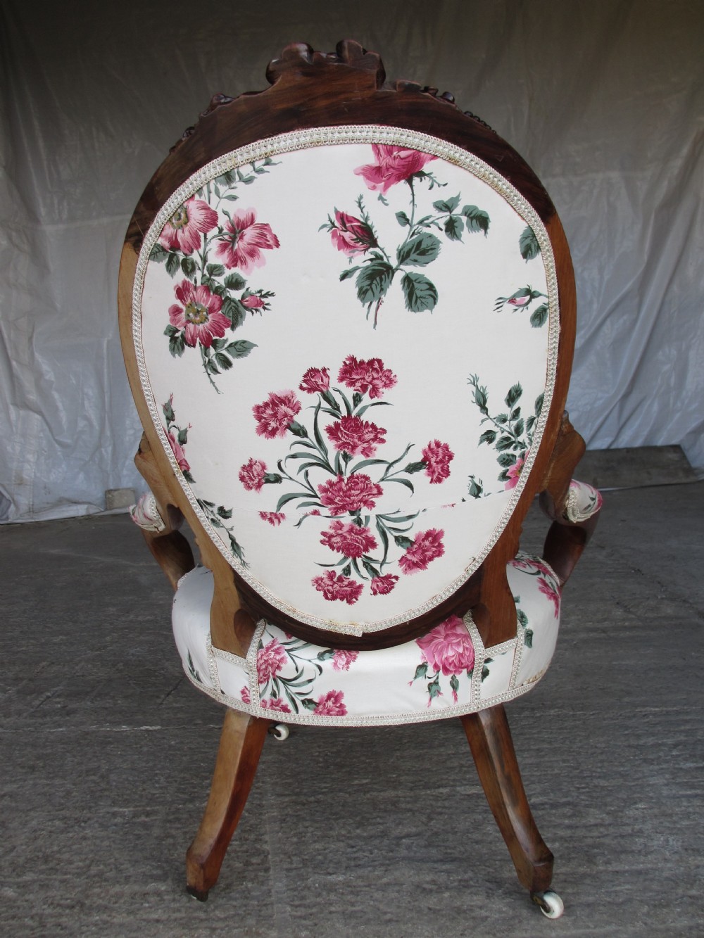 Early Victorian mahogany carved show wood button upholstered spoon back armchair View XI