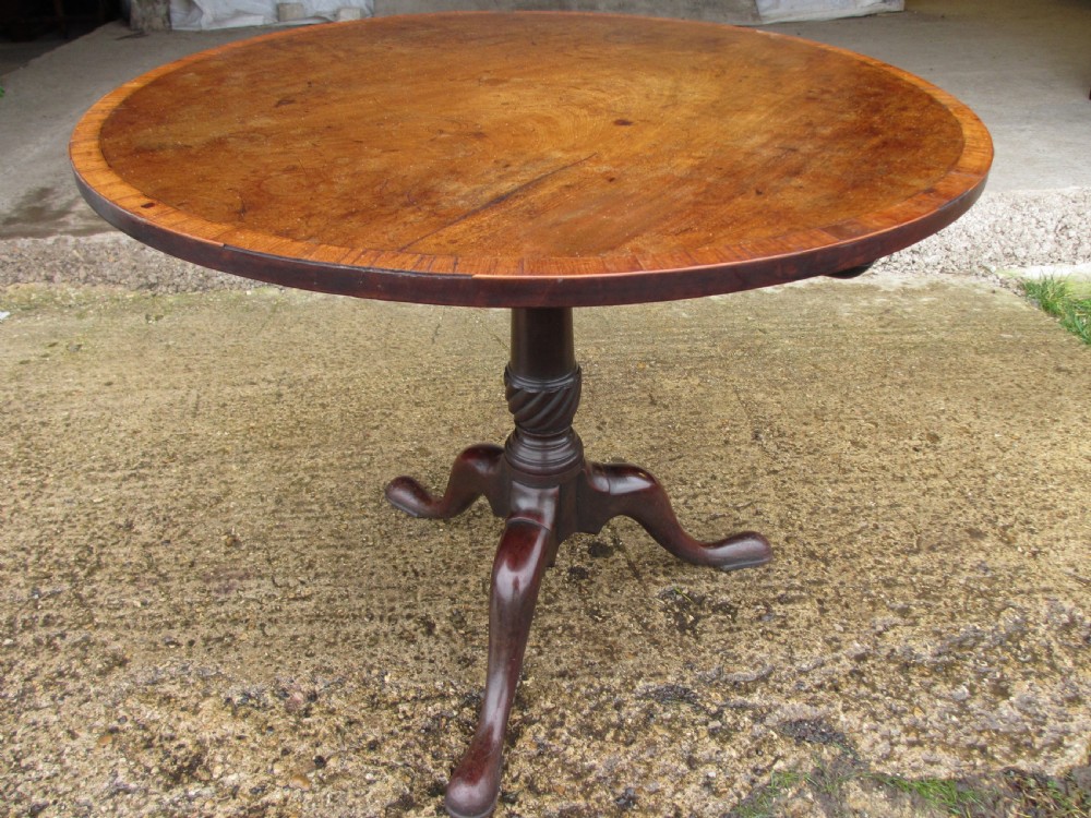 Georgian mahogany and cross banded tilt top breakfast table