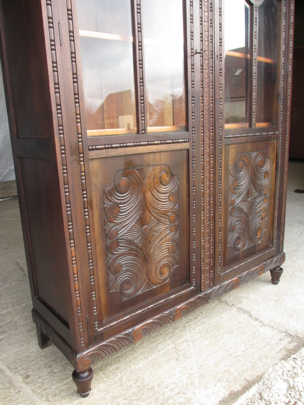 Pair of carved Brazilian mahogany glazed bookcases  View VI