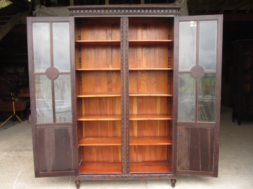 Pair of carved Brazilian mahogany glazed bookcases  View IX